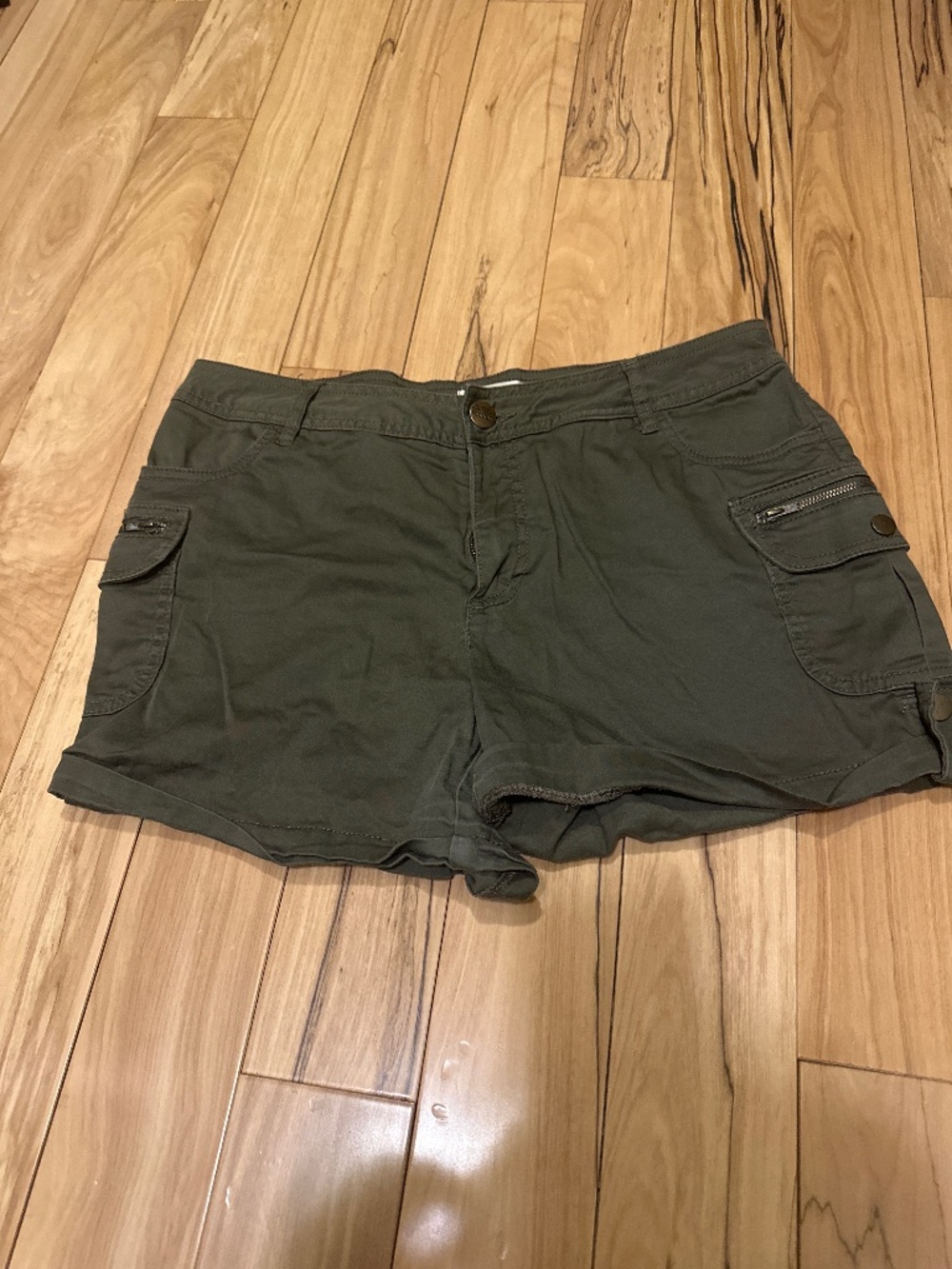 Size 11/12 97% cotton 3% spandex hunter green shorts